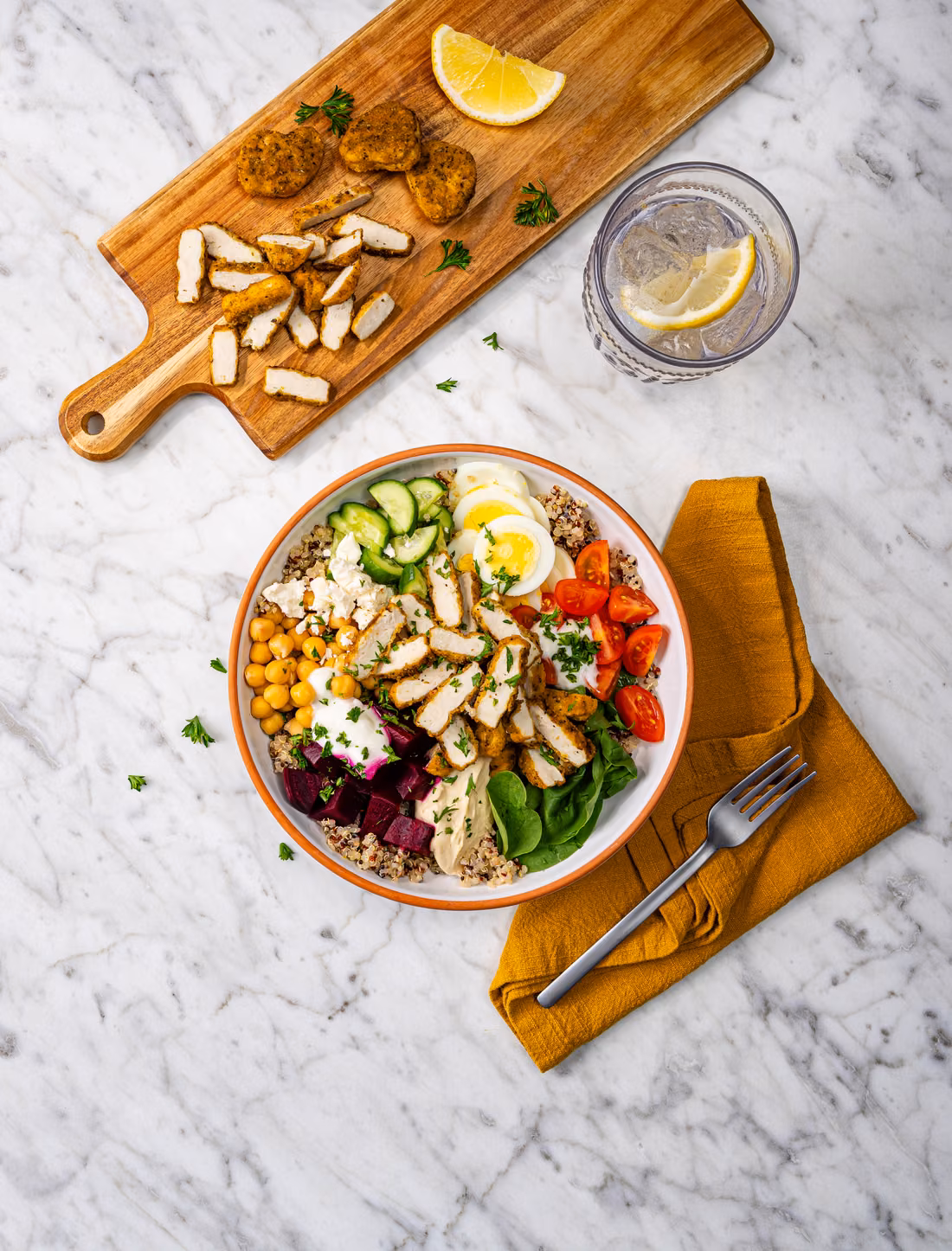 Mediterranean Chicken Protein Bowl, made with Skinny Butcher Crazy Grilled Chicken Nuggets